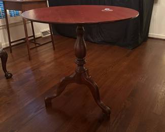 B146 - $50. Vintage Tilt Top Table. Measures 29.5" round x 29.5" tall. Does not have the pin to hold the table flat - so it needs a minor repair.