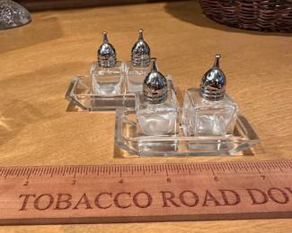B100 - $10. 2 sets of Salt & Pepper Shakers with Tray.