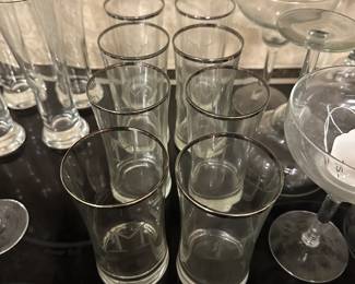 B123 - $70. Pitcher & 8 Glasses. Monogrammed with an "M". Silver Banded.