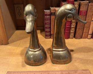 B93 - $50. PAIR of Duck Head Brass Bookends.