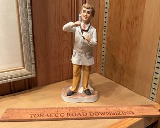 B85 - $10. Porcelain Doctor Figurine.