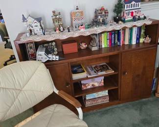 Christmas Village pieces and antique cabinet