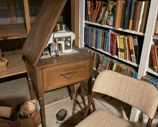 Singer Sewing Machine and lots of old books dating back to the 1940s