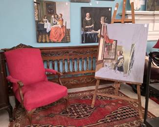 Upholstered arm chair, "After" art, rug