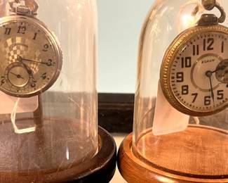Pocket watches in display dome case