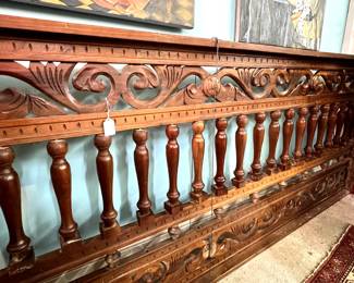 Elaborate railing bannister...great headboard!