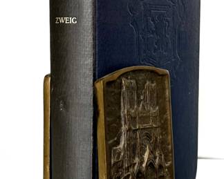 Biography, brass bookends Cathedral motif