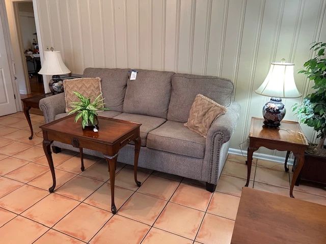 nice sofa, tea table and matching end tables, lamps