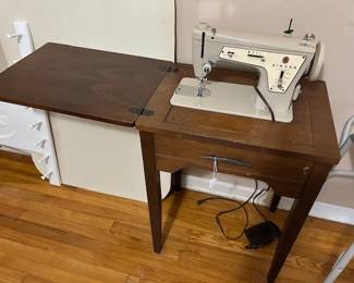 Singer sewing machine and notions