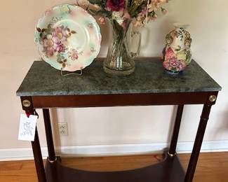 we have 2 of these green marble topped foyer tables