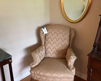 wingback chair, oval beveled mirror