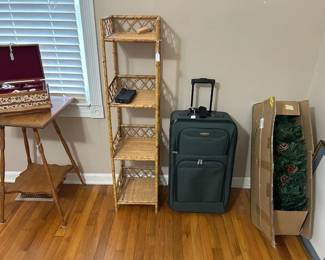lamp table, sewing basket, etegere, luggage, small tree