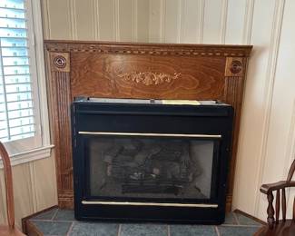gas logs and fireplace mantle, sold separately