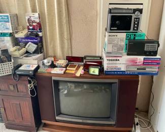 Console TV, Games, Radios, DVD/VHS Player, Clocks.