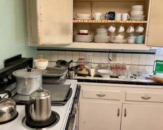 Glasses. Cups. Plates. Teapot.