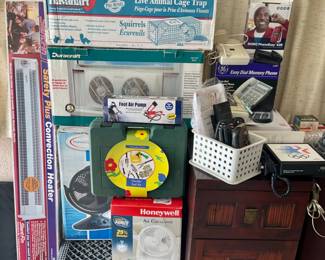 Animal Cage/Trap, Fans, Convection Heater, Gardening Kit, Remotes, & Landline Phones.