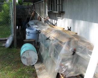 even things outside the garage, wood trim, boards, eves trough items, siding items and more