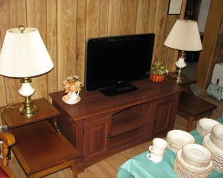 another pair of end tables and lamps, flat screen and tv stand