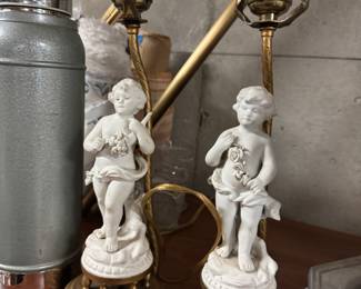 Pair of cherub lamps, bisque