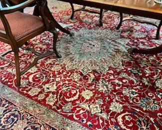Antique rug under dining room table