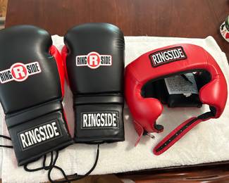 Boxing gloves and headgear . New condition 30.00 for set