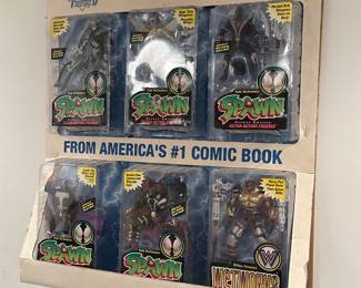 Spawn display with original toy packaged items