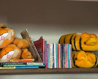 Garfield items to include figurines, slippers, books and more