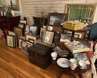 Stacks of vintage pieces of art and hung all over the house too!