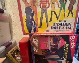 Dozens of boxes of Barbie - some unopened boxes