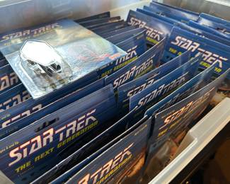 Boxes of Star Trek items still in original boxes