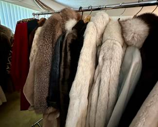 The clothing room has racks of vintage clothes, coats, furs, designer duds, hats, cashmere, shoes, handbags - enough to start your own vintage clothing store!