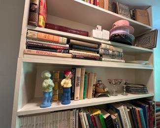 Shelves of books in several rooms