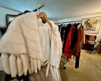 The clothing room has racks of vintage clothes, coats, furs, designer duds, hats, cashmere, shoes, handbags - enough to start your own vintage clothing store!