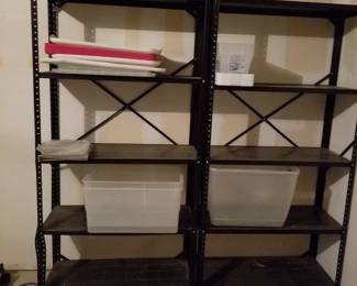 2 black metal shelves