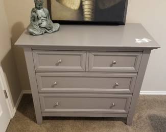 Gray dresser matches queen bed