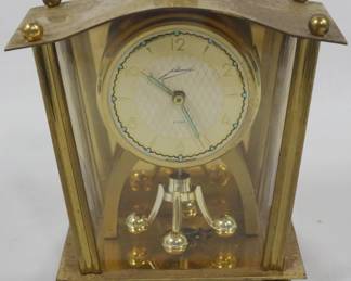 107 - Vintage Schmid-Schlenker 8 Day Clock 5" You are buying a used as-is item. We do not guarantee all components are present, and if it is not expressly stated, it is untested.