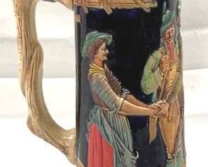 2097 - Vintage Marzi & Remy German Beer Stein w/ lid 17" tall - 3L - text on stein translates to "It's beautiful on the alpine pasture" and features a relief scen of hunters