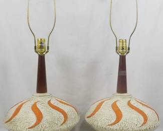 141 - Pr MCM Orange Swirl Genie Lamps 29" You are buying a used as-is electric/electronic item. We do not guarantee all components are present, and if it is not expressly stated, it is untested.