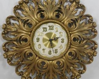 126 - Mid Century Burwood Wall Clock 23" You are buying a used as-is electric/electronic item. We do not guarantee all components are present, and if it is not expressly stated, it is untested.