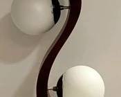 1363 - Vintage Milo Baughman Modeline Floor Lamp 60" tall, 3 globes, 1 has chip that has been reglued You are buying a used as-is electric/electronic item. We do not guarantee all components are present, and if it is not expressly stated, it is untested.