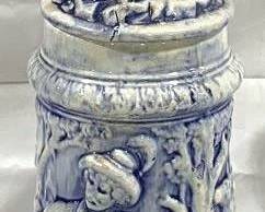 2113 - Vintage Salt Glazed German Beer Stein w/ lid 15.5" tall - features a relief scene of a hunter & animals