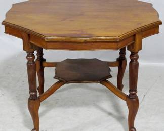 3937 - Octagonal mahogany center table 27 x 34