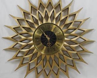 125 - Mid Century Eigin Starburst Clock 24" You are buying a used as-is electric/electronic item. We do not guarantee all components are present, and if it is not expressly stated, it is untested.