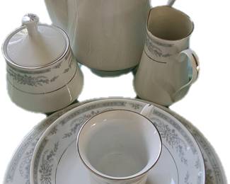Coffee pot, creamer & sugar - only 5 cups (no saucers - yet - they might turn up...?), 7 or 8 of bowls, salad/dessert plates,& dinner plates