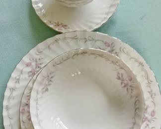 5 complete place settings plus lots of extras