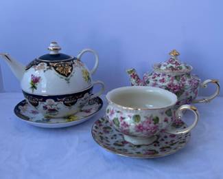 Two Teapots with Cups