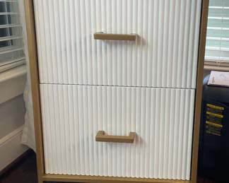 White & gold file cabinet