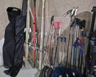 Skis and poles, snowboard