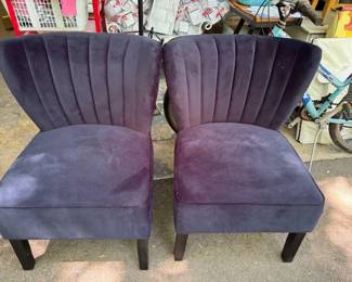 Pair of blue velour chairs.