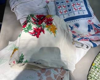 Vintage table clothes (stained and torn) - great for craft projects.